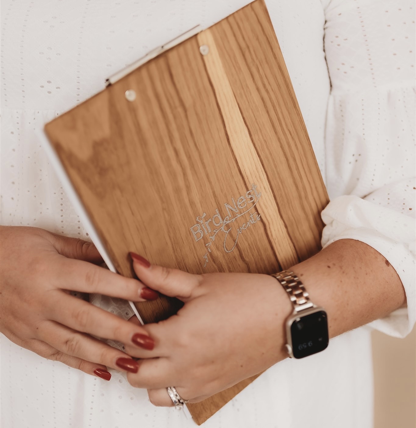 person holding a planning book