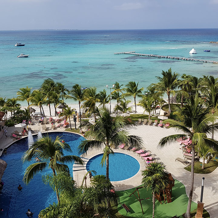 view of a resort's pools from above