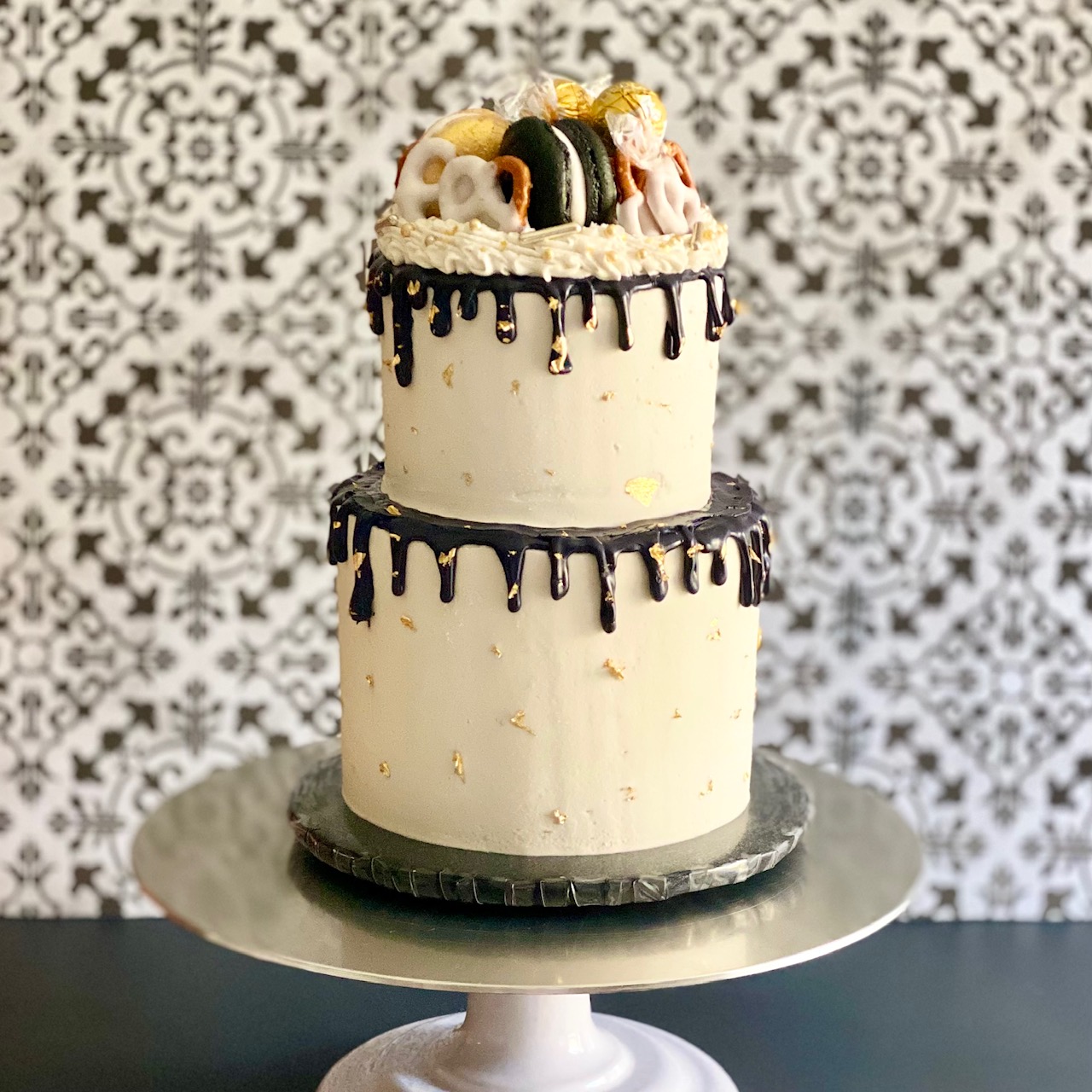 a wedding cake with snack cakes on top